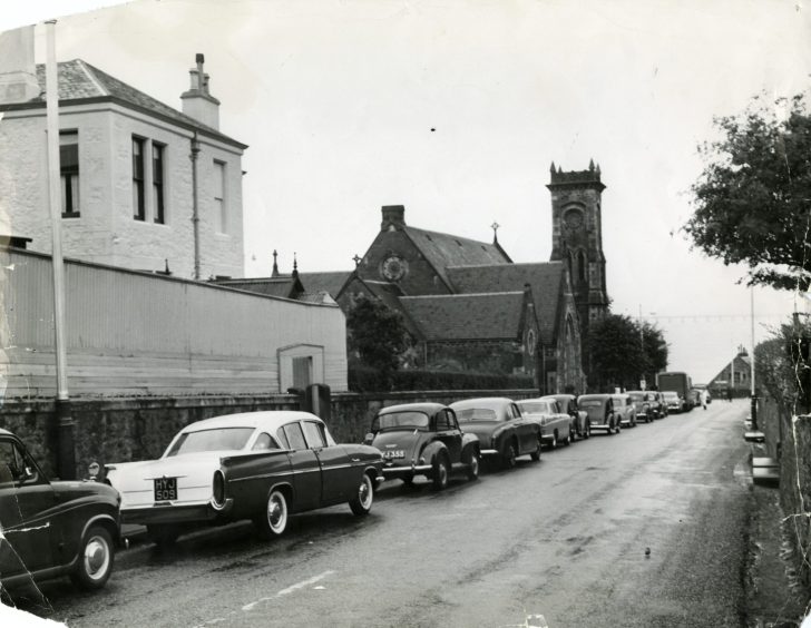 cars line up in a Queue for the ferry after Saturday's play at the golf in St Andrews