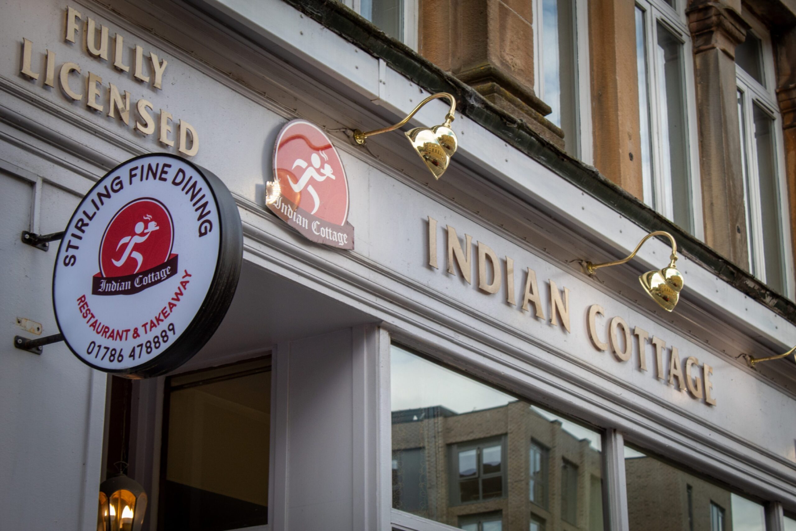 Exterior sign of Indian Cottage restaurant 