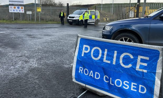 Police outside Wellwood recycling centre, Dunfermline. Image: Neil Henderson/DC Thomson