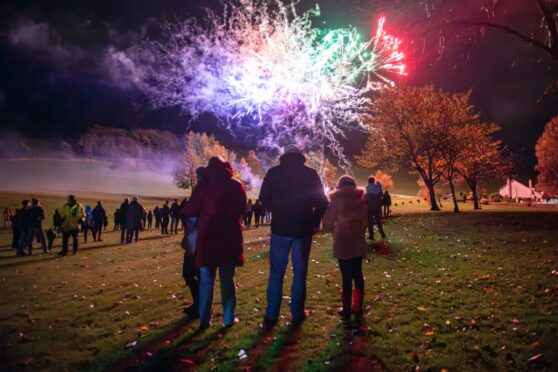 Families enjoying Cupar fireworks display in 2023. Image: Kim Cessford/DC Thomson