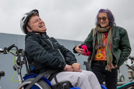 Brett Brough shares a joke with the chair of the Dundee Cycling Forum Valentine Scarlett. Image: Kim Cessford/DC Thomson.