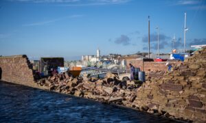 A wall at Arbroath Harbour was smashed in bad weather. Image: Kim Cessford / DC Thomson