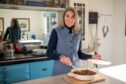 Anona Gow cooking a venison dish on her Aga.