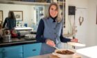 Anona Gow cooking a venison dish on her Aga.