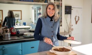 Anona Gow cooking a venison dish on her Aga.