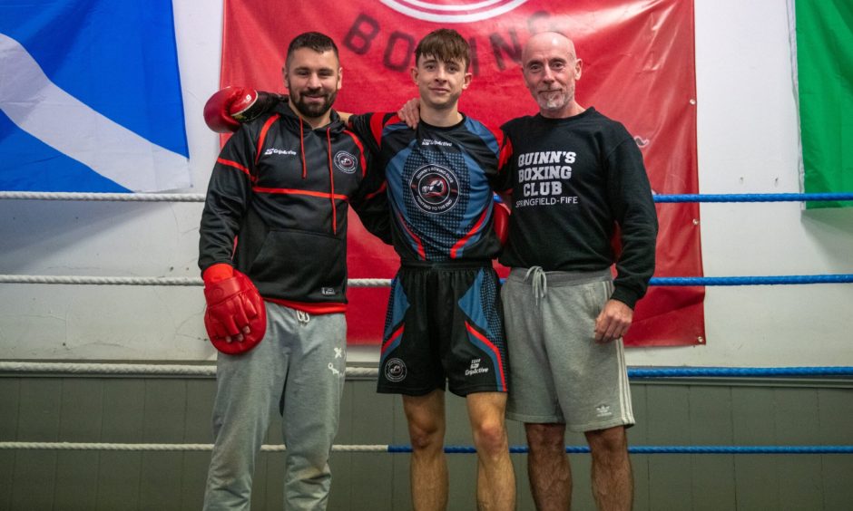 Monty Ogilvie, Finlay Adams and Kieran Quinn take a break from training at Quinn's Boxing Club in Springfield, 