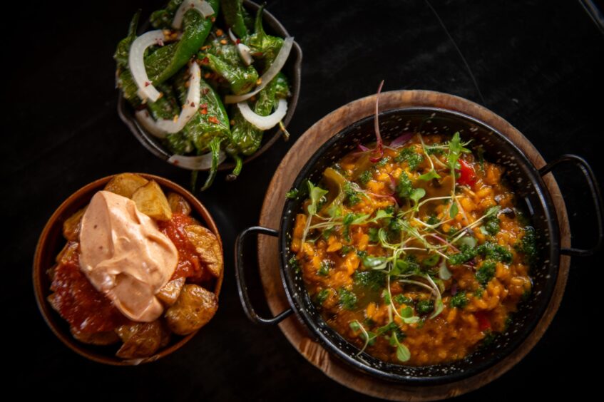 Padron peppers, patatas bravas and vegetable paella at Sol y Sombra.