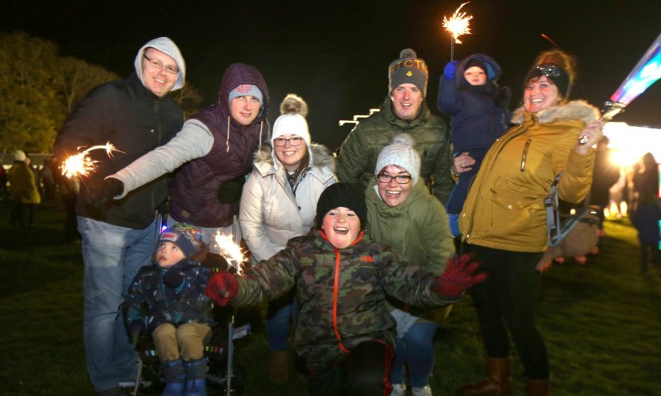 The Maxwell and Reid families enjoying the Lochee Park fireworks display. 