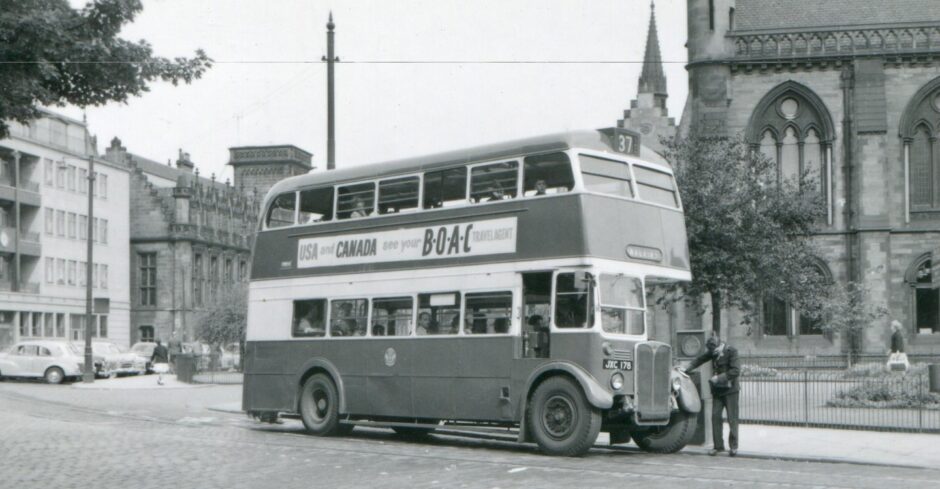 The crew of ex-London Transport RT have a rest at Albert Square.