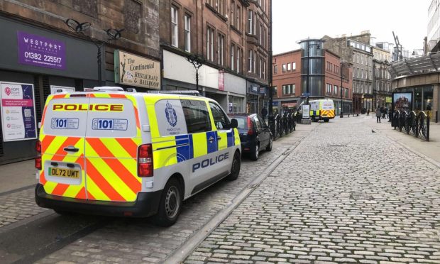 Police at Cowgate, Dundee. Image: James Simpson/DC Thomson