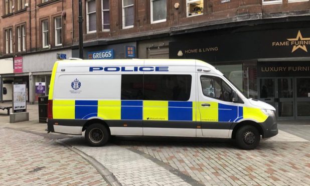 A police van on Cowgate, Dundee. Image: James Simpson/DC Thomson