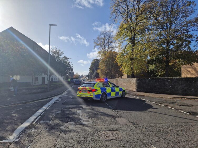 Police at the scene of the crash. 