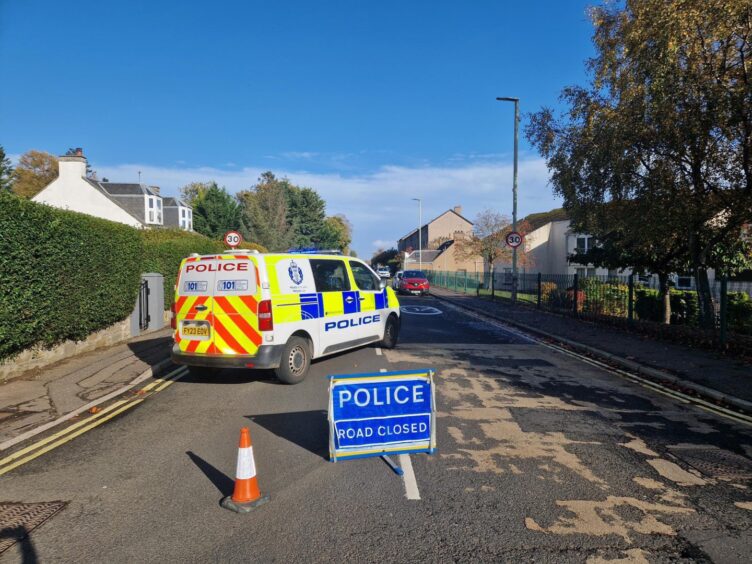 Police closed the road after the crash.