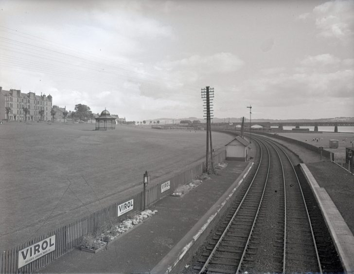 The railway station in 1956, with the railway track stretching towards the bridge and properties on the edge of the picture