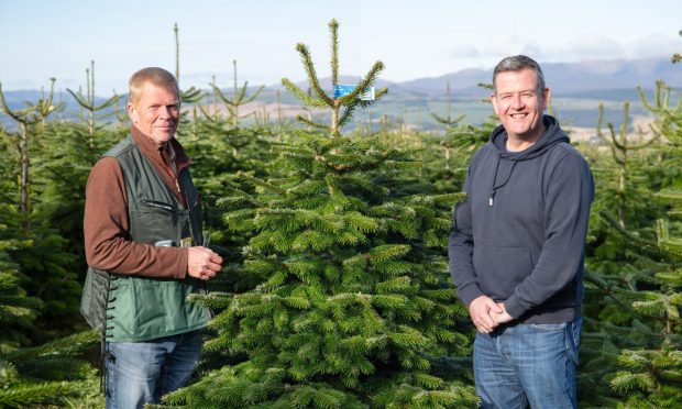 Dobbies’ Plant Buyer Nigel Lawton with Kenneth Mitchell from Needlefresh.