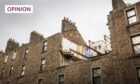 Tenement flats on Blackness Road in Dundee during demolition.