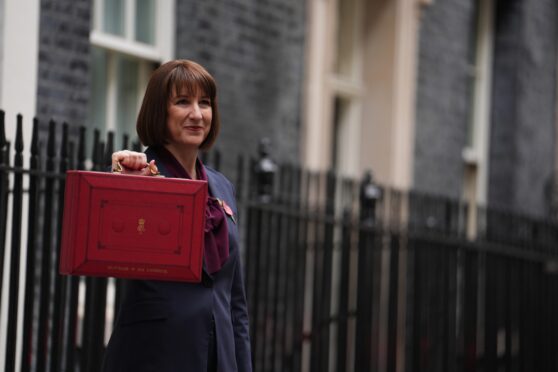 Chancellor Rachel Reeves leaves 11 Downing Street with her ministerial red box before delivering her first Budget. Image: Jordan Pettitt/PA Wire