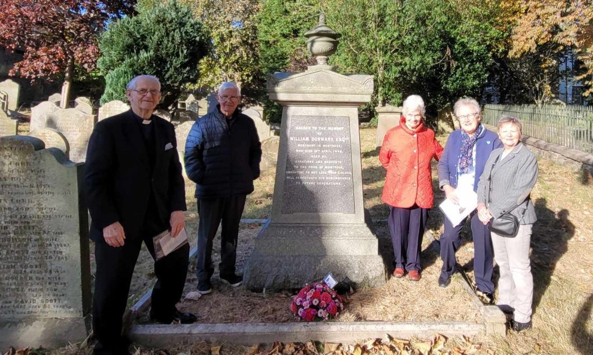 Dorward House residents and officials at the graveside ceremony. Image: Supplied