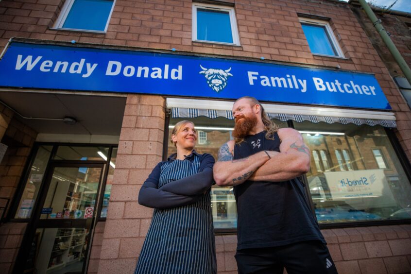 John Beattie and Wendy Donald outside butcher shop