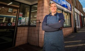 Wendy Donald arms folded outside her Blairgowrie butcher shop