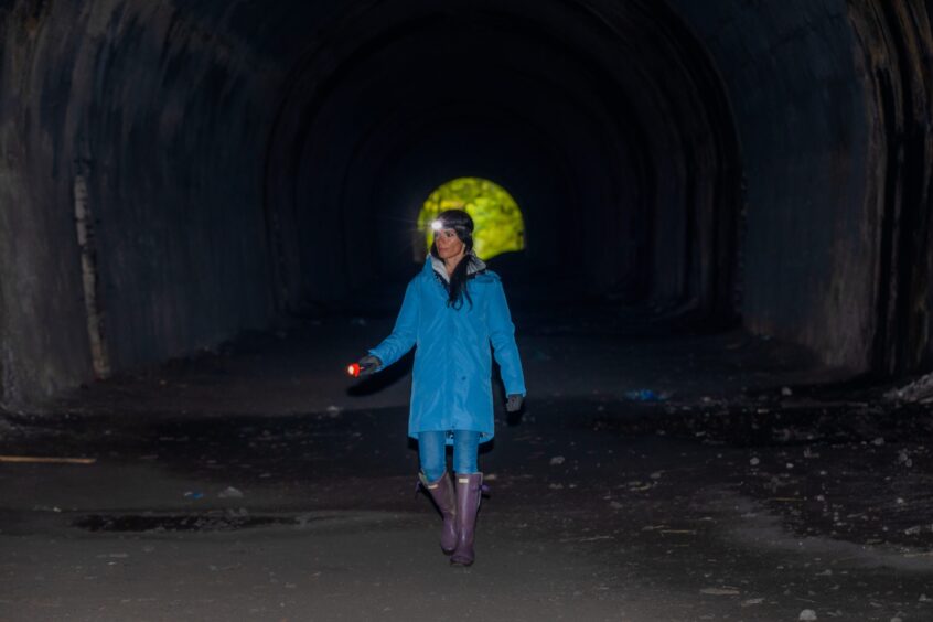 Gayle in anxious explorer mode in Glenfarg railway tunnels. Image: Steve MacDougall.