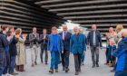 First Minister and SNP leader John Swinney with the new Dundee City councillors Lee Mills (left) and Jimmy Black. Image: Steve MacDougall/DC Thomson.