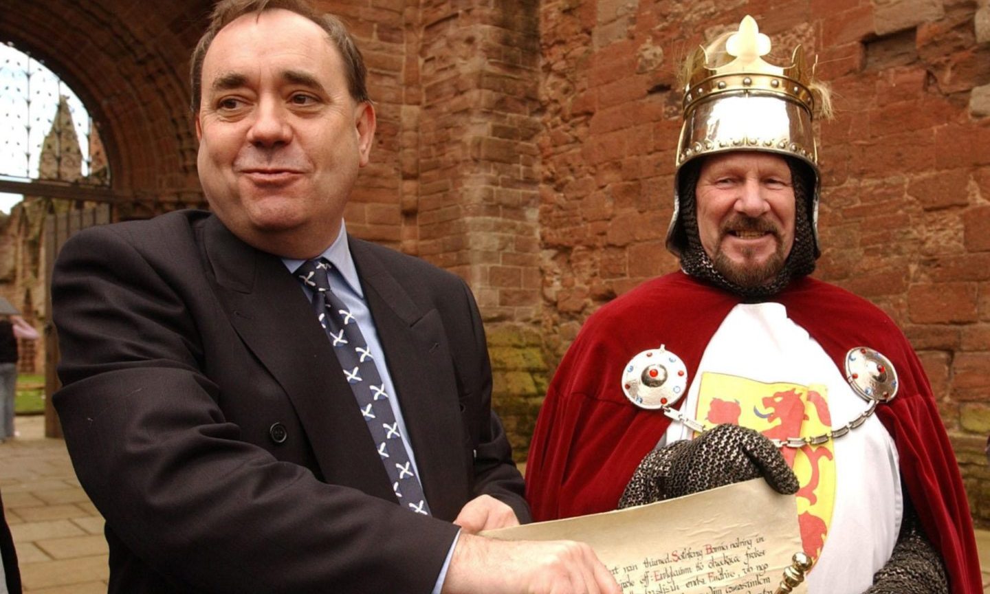 The funeral of Marion Sharp, pictured with son Allan, was due to take place at Parkgrove in Angus on Monday.