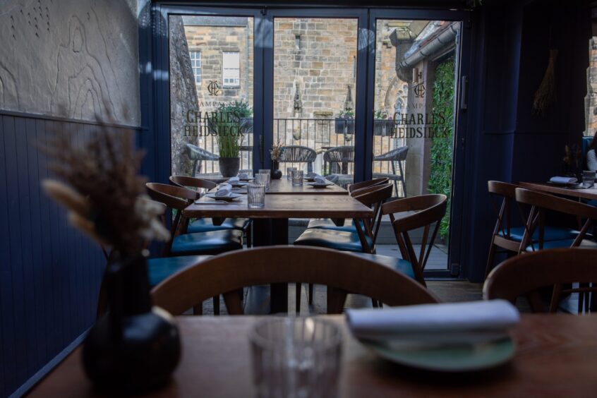 A table by the window upstairs at Dune restaurant.