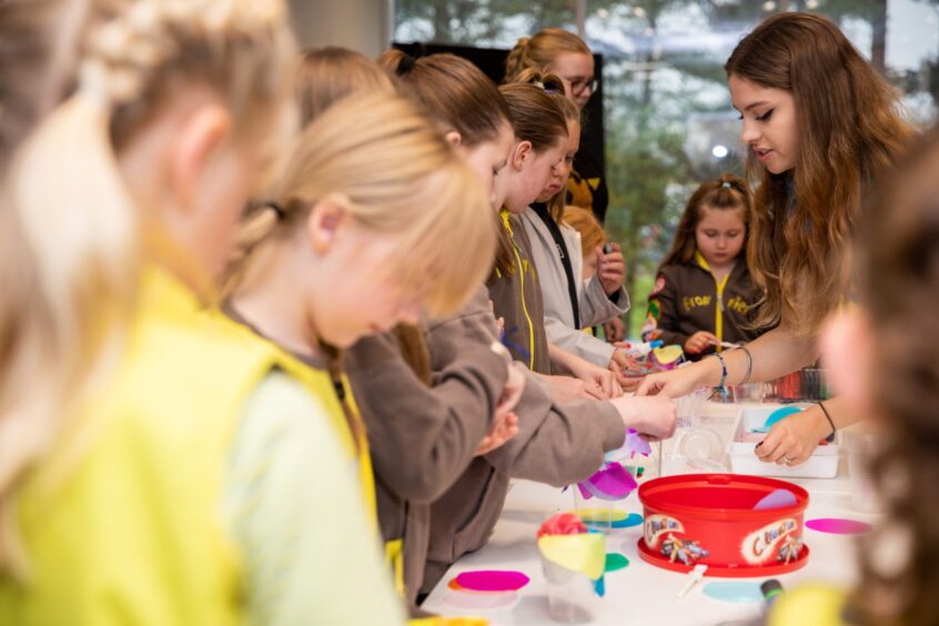 Brownies from 29th Stobbswell, 30B Barnhill and 31st A Perth Road take part in Scrap Antics.