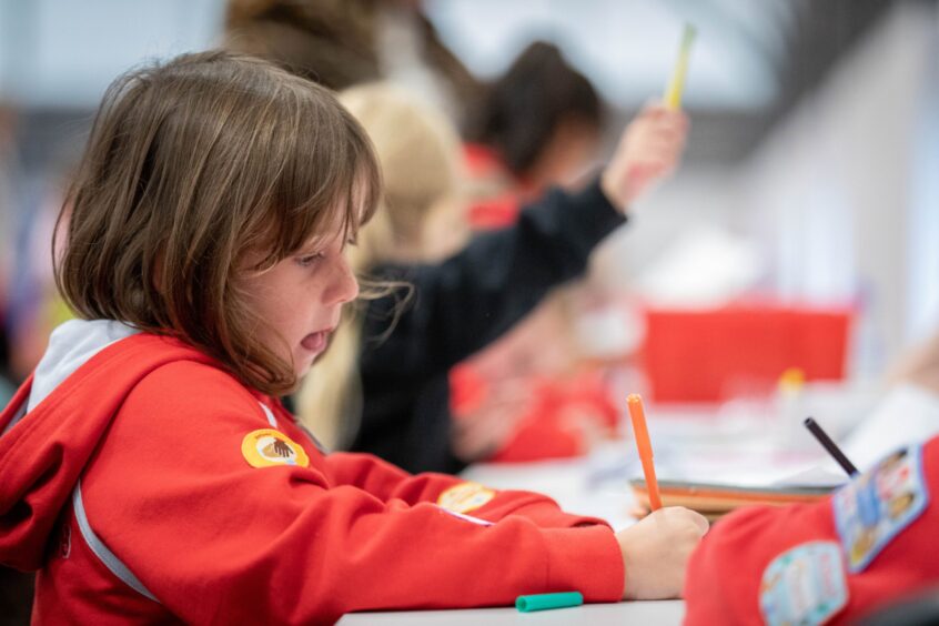 Rainbow Kitty Miller from Dundee takes part in art activities.