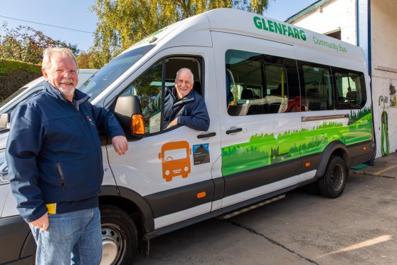 Drew Smart and Douglas Fraser with a bus from the Glenfarg Community Transport's fleet. Image: Steve Brown/DC Thomson.