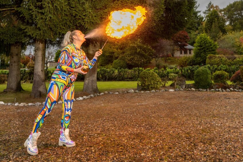 Verity practices her fire-breathing in Blairgowrie.