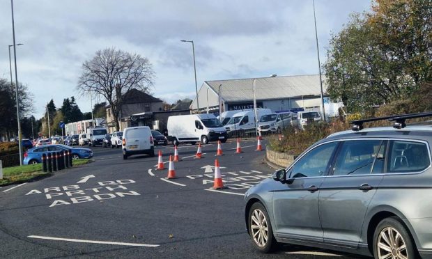 The inside lane of the Scott Fyffe Roundabout is coned off.