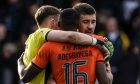 Jack Walton, Emmanuel Adegboyega and Declan Gallagher, left to right, embrace after downing St Mirren