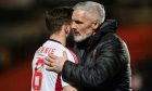 Jim Goodwin, right, and Dons stalwart Graeme Shinnie