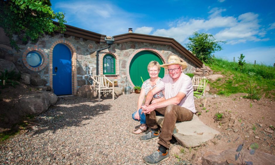 Heather and Ian Keir outside a hobbit home back in 2018.