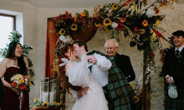 Rev Donald Fraser performed the wedding ceremony for his granddaughter Iona to husband Callum Wood, 2023. Image: Supplied.