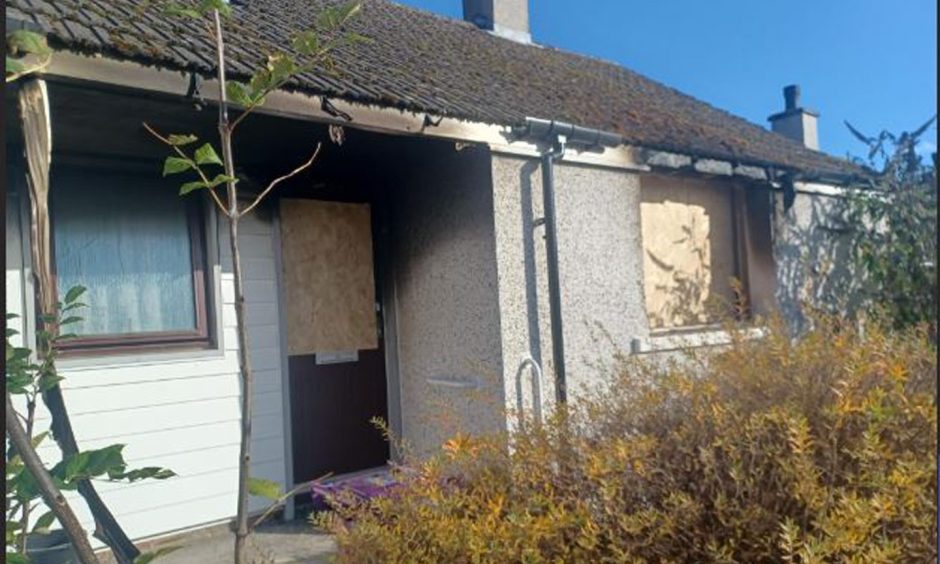 Neighbour describes thick black smoke at Angus house fire