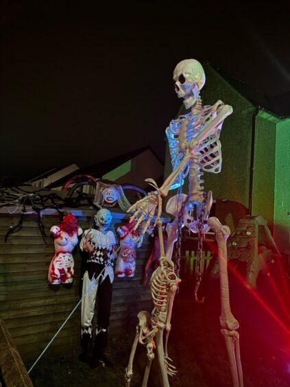 Skeleton in garden of Kirriemuir Halloween house.