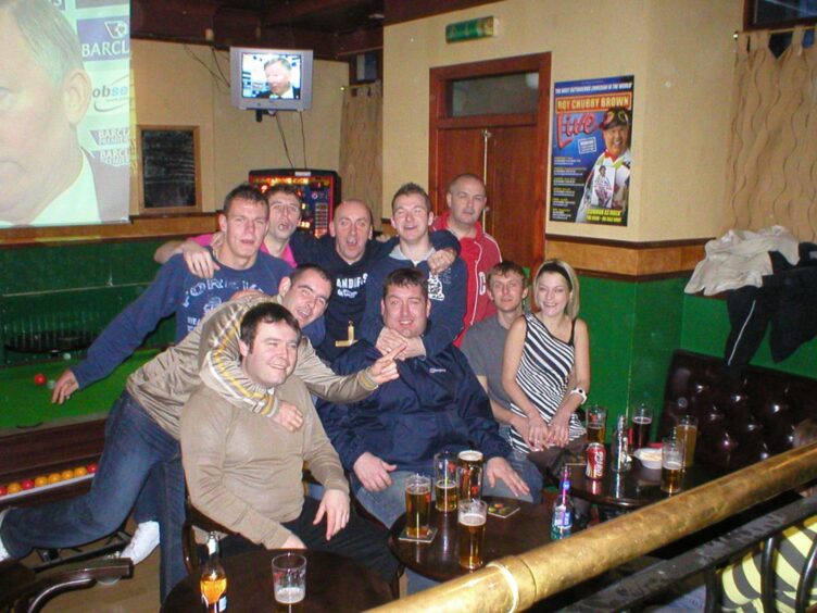 The darts team from the Shakespeare Bar, Dundee, enjoying their Christmas night out in the pub