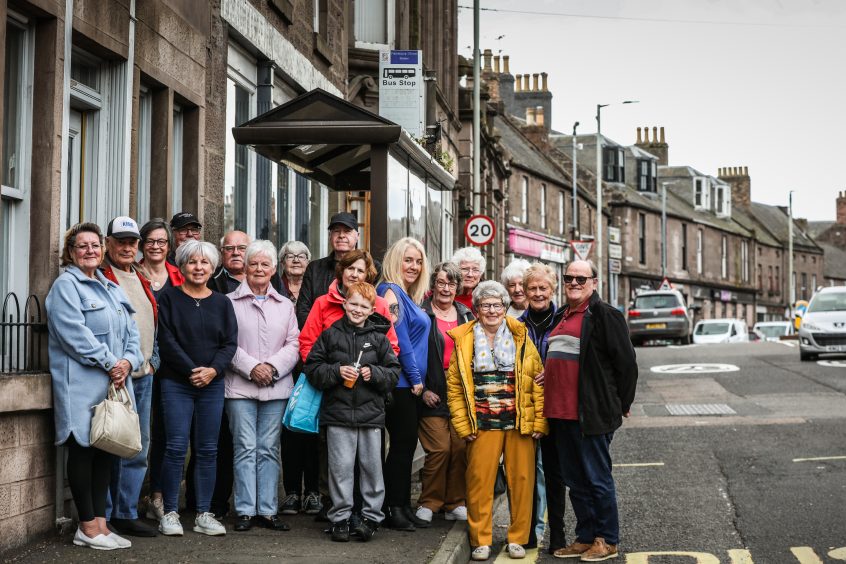 Happy Brechin residents at the bus stop which the new Ember service will use.