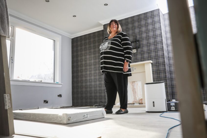 June Soutar in her flood-hit Brechin home. Image: Mhairi Edwards/DC Thomson.