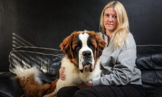 Carol Smith and her puppy, Jarvis. Image: Mhairi Edwards/DC Thomson