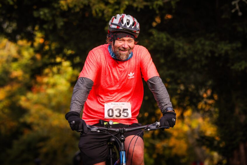 Cyclist in House of Dun duathlon event near Montrose.