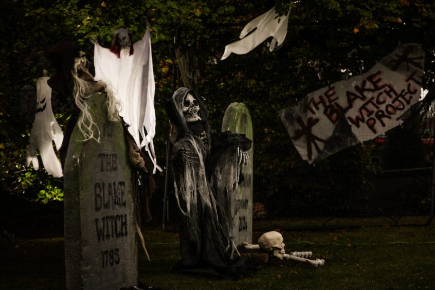 The art teacher has built a crypt, gravestones for his very own 'Blake Witch Project' on Blake Avenue. 