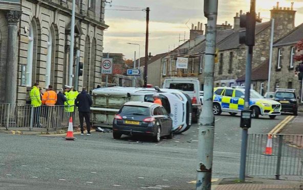 Openreach van on its side on Loughborough Road, at the junction with St Clair Street, Kirkcaldy.