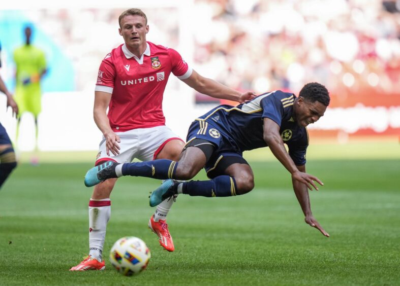 Sam Dalby, left, in action during Wrexham's pre-season tour to North America.