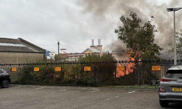 The fire took hold in a car park at Dundee PDSA Pet Hospital off Annfield Road. Image: Supplied