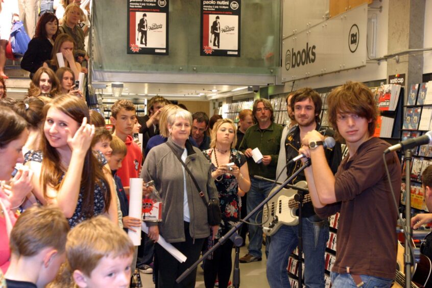 Crowds gather to watch Paolo Nutini performing at Fopp in 2006. 