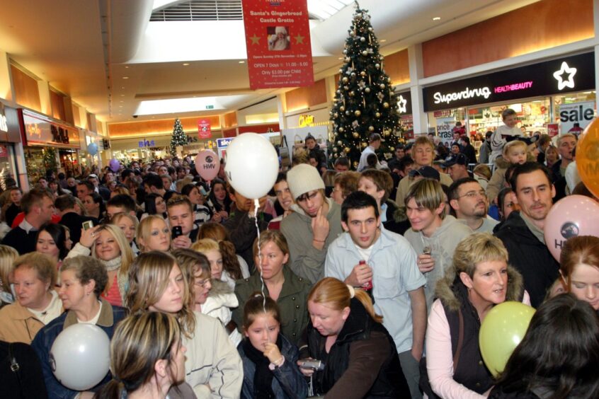 crowds of fans inside the Mercat Shopping Centre